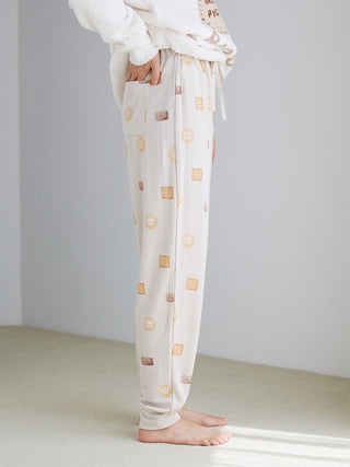 Side view of Biscuit Pattern Waffle Pajama Pants with cozy biscuit motifs, ideal for lounging and relaxation.