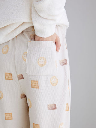 Close-up of Biscuit Pattern Waffle Pajama Pants with cozy waffle-knit fabric and playful biscuit motifs by Gelato Pique.