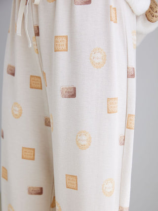 Gelato Pique biscuit pattern waffle pajama pants close-up, showcasing cozy knit fabric with playful biscuit motifs for home lounging.