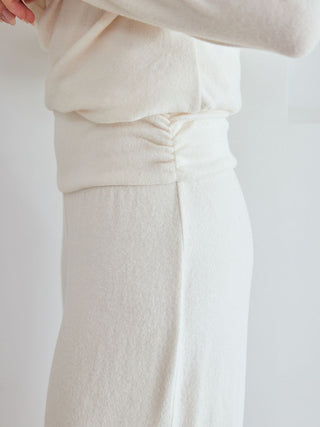 Snow High-Waisted Lounge Pants in soft white fabric, showcasing a wide-leg silhouette for relaxed comfort and style.