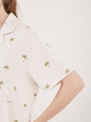 Close-up of fruit motif loungewear sleep shirt with palm tree pattern, highlighting soft rayon fabric for summer comfort.