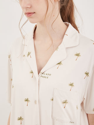 Fruit motif loungewear sleep shirt with palm tree print, soft rayon fabric, ideal for summertime comfort and style.
