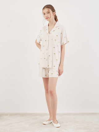 Model wearing Fruit Motif Loungewear Sleep Shirt and Shorts, showcasing chic summer style in soft, cool rayon fabric.