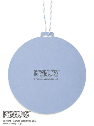 Round blue PEANUTS branded tag with logo and copyright notice from Peanuts Worldwide LLC.