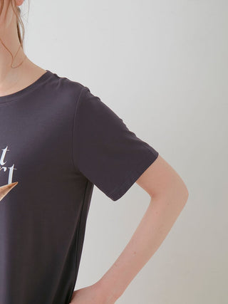 Side view of COOL Rayon Dessert Logo Relaxed Fit T-shirt in black, featuring minimalist design and soft fabric for ultimate comfort.