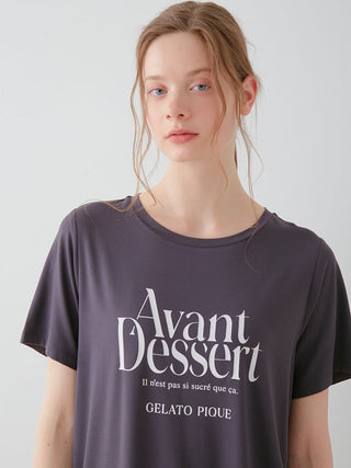 Model wearing COOL Rayon Logo Relaxed Fit T-shirt in soothing pink, featuring Avant Dessert design, showcasing luxurious comfort and style.