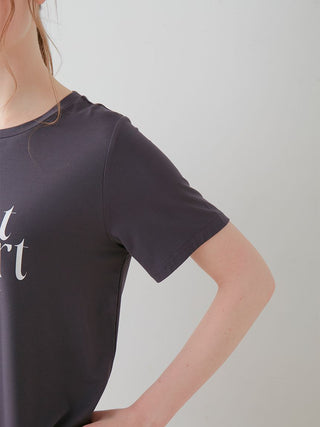 Close-up of COOL Rayon Logo Relaxed Fit T-shirt in black with elegant logo design, showcasing soft rayon fabric and short sleeves.