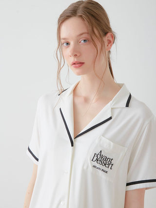 Woman wearing COOL Rayon Logo Button-Up Sleep Shirt in white by Avant Dessert with Gelato Pique USA logo.
