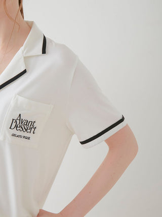 Close-up of Avant Dessert Rayon Button-Up Sleep Shirt by Gelato Pique USA, featuring logo on pocket and chic black trim detailing.