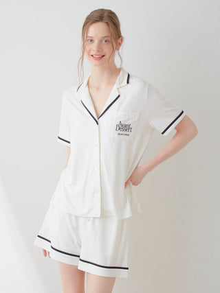 COOL Rayon Logo Button-Up Sleep Shirt by Avant Dessert in white, worn by model, showcasing chic casual loungewear by Gelato Pique USA.