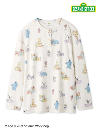 Sesame Street all-over print pullover with colorful character design on soft rayon-blend fabric, featuring Henley-neck and buttons.