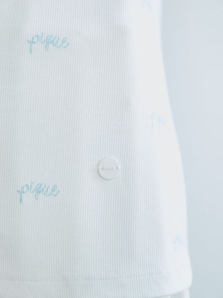 Close-up of Motif 3-Pattern Long Sleeve T-Shirt with blue script print on soft fabric.