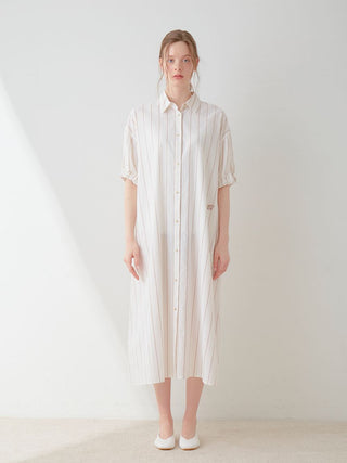 Woman wearing Resort Woven Striped Shirt Midi Dress with neutral vertical stripes, showcasing elegant and refined style.