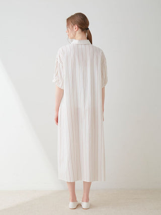 Rear view of Resort Woven Striped Shirt Midi Dress in neutral tones, showcasing its elegant vertical stripe design and classic flair.
