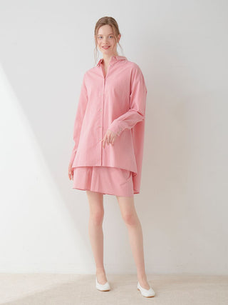 Woman wearing soft pink Resort Woven Lounge Shorts set, designed for ultimate comfort and casual elegance.