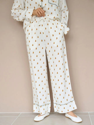 Cozy Variation Pajama Pants by Gelato Pique in white with a cute teddy bear pattern, perfect for comfortable lounging.