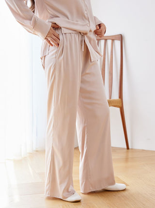 Luxurious satin pajama pants with an elegant sheen, featuring a relaxed fit for comfort and sophistication in loungewear.