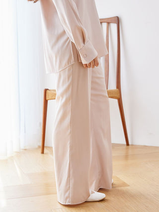 Luxurious satin pajama pants with an elegant sheen and relaxed fit, perfect for comfortable lounging or sleeping.