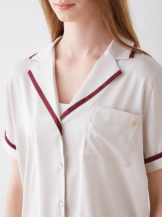 Lined satin sleep shirt with collar, showcasing luxurious fabric and chic design details.
