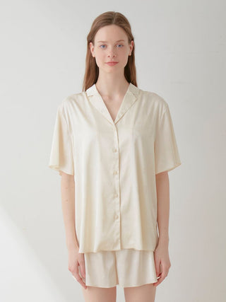 Model wearing a luxurious Flower Satin Pajama Sleep Shirt with a delicate floral print, exuding elegance and comfort.