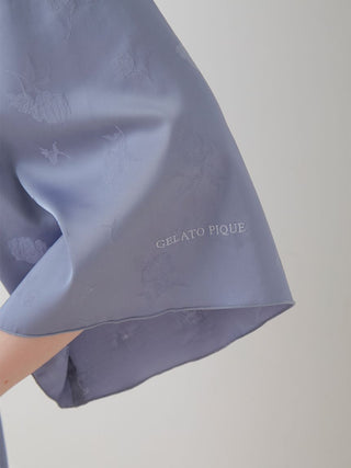 Close-up of Flower Long Sleeve Satin Tie Nightgown Robe in blue by Gelato Pique, showcasing floral pattern and smooth satin fabric.