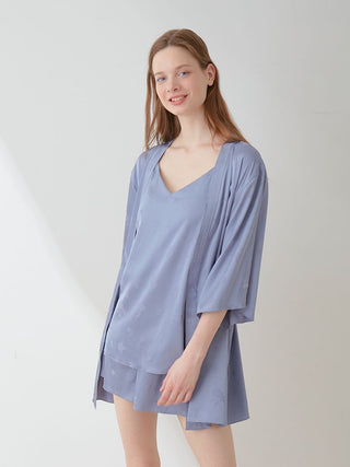 Alt Tag: Woman wearing a Flower Long Sleeve Satin Tie Nightgown Robe, showcasing its elegant floral pattern and smooth satin texture.