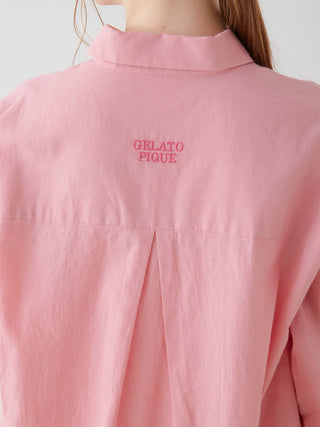 Back view of pink oversized shirt with "Gelato Pique" embroidery on the upper back.