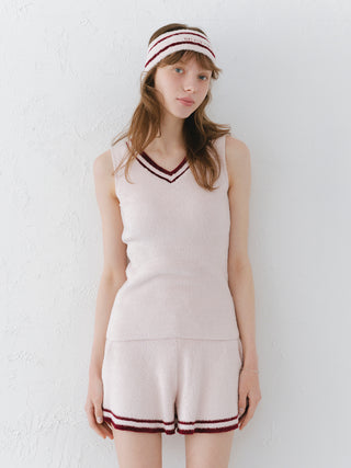 Woman wearing chic Smoothie Logo Jacquard Hairband and matching uniform-inspired outfit; part of Gelato Pique's NAP SOCIETY series.