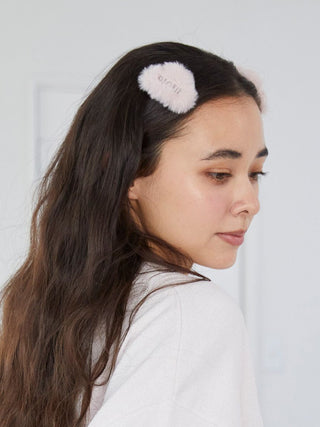 Woman wearing an Eco Fur Hair Clip by Gelato Pique, featuring soft, eco-friendly faux fur for a chic touch to hairstyles.