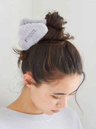Woman wearing Eco Fur Claw Clip in her hair, showcasing the plush, eco-friendly faux fur design and secure grip by Gelato Pique.