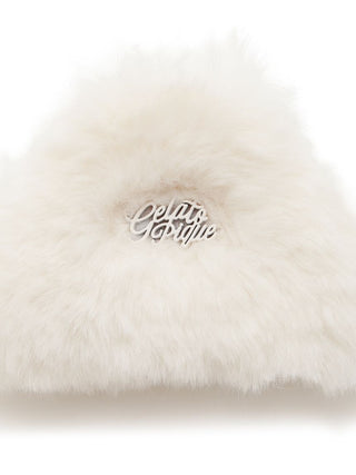 Alt Tag: Plush fur hair clip with Gelato Pique logo, exuding elegance and warmth, perfect for holiday style.