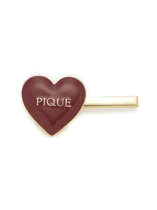 Heart-shaped hairpin with 'Pique' text and gold-tone accents, elegant and playful accessory from Gelato Pique USA.