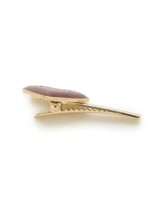 Heart-shaped hairpin with gold-tone accents, adding elegance to any hairstyle; part of the Gelato Pique USA collection.
