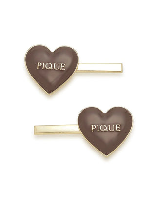 Glossy heart-shaped hairpins with gold accents from Gelato Pique USA, ideal for adding romantic charm to any hairstyle.