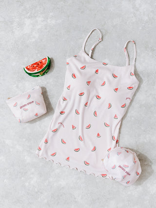 White chiffon pouch with pink fruit motifs, matching camisole, and round pouch on gray background.