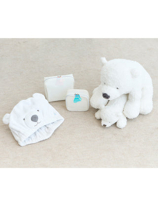Vinyl Polar Bear Pouch Bag with plush polar bear and accessories, featuring water-resistant PVC material for summer use.