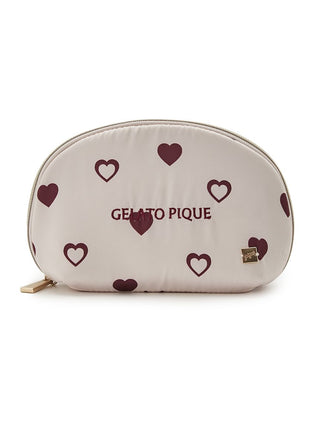 Charming heart pattern pouch with scattered hearts design in a half-moon shape, perfect compact accessory with inner pocket for small bags.
