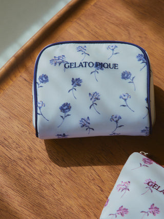 Rose Patterned Square Pouch by Gelato Pique on wooden table, featuring vintage style floral design on off-white fabric.
