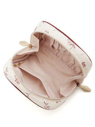 Interior view of the rose patterned square pouch with zip open, showcasing spacious compartments, from Gelato Pique.