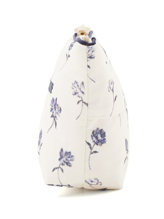 Side view of a rose-patterned tissue pouch with delicate floral prints and a zip closure, perfect for elegant, on-the-go convenience.