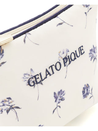 Rose patterned tissue pouch with purple floral design and Gelato Pique logo embroidery.
