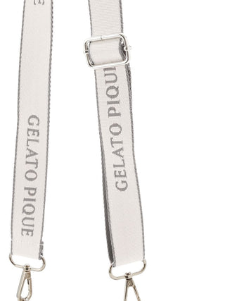 Adjustable strap on Gelato Pique Faux Fur Mini Sling Bag with silver hardware