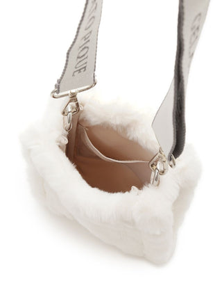 Inside view of Gelato Pique faux fur mini sling bag showing plush, eco-friendly interior with a secure flap closure.