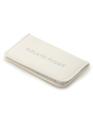 Cream GELATO PIQUE colorful passport case with embossed logo, sleek design for stylish travel.