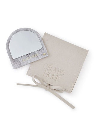Acetate small mirror with cat motif and marbled design next to a beige branded pouch, both on a white background.