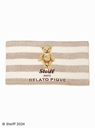 Steiff throw blanket with teddy bear embroidery on striped beige and white background