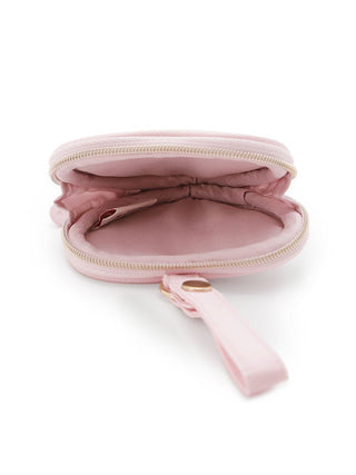 Open pink heart-shaped mini pouch with zipper, showing interior space for small items, by Gelato Pique.