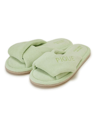 Luxurious pile cozy indoor slip-on bedroom slippers in soft green with wide overlapping strap for ultimate comfort by Gelato Pique.