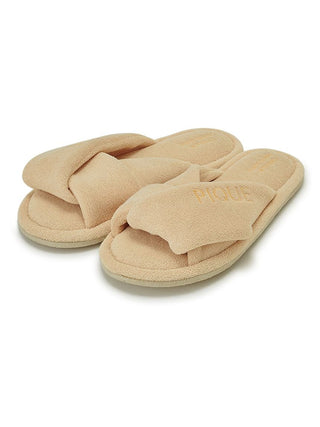 Gelato Pique Pile Cozy Indoor Slip On Bedroom Shoes in beige with soft textured fabric and wide strap for comfort and relaxation.