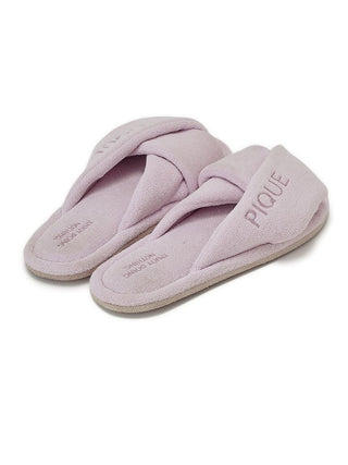 Luxurious pink pile cozy indoor slip-on bedroom slippers with wide fabric strap for ultimate home comfort and relaxation.